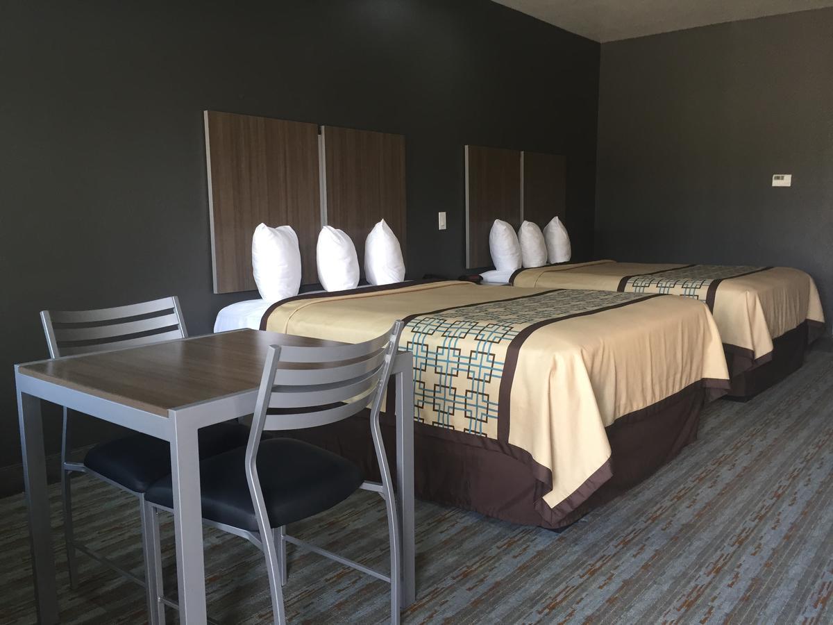 Scottish Inn & Suites - Conroe Esterno foto